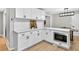 Well-designed kitchen with stainless steel microwave and white cabinets offering modern convenience and ample storage at 5341 Tall Oak Dr, Marietta, GA 30068