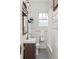 Small bathroom has a toilet, a sink, and a shower/tub combination at 608 Hardendorf Ne Ave, Atlanta, GA 30307