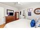Comfortable bedroom with natural light, neutral walls, and wood floors at 608 Hardendorf Ne Ave, Atlanta, GA 30307