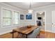 Dining room features a wooden table and view into the kitchen area at 608 Hardendorf Ne Ave, Atlanta, GA 30307