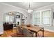 Dining room features a wooden table and view into the living area at 608 Hardendorf Ne Ave, Atlanta, GA 30307