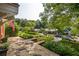 Beautifully landscaped front yard with stone steps leading to the front porch at 608 Hardendorf Ne Ave, Atlanta, GA 30307