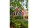 Attractive brick home with a well-manicured lawn and welcoming front entrance at 608 Hardendorf Ne Ave, Atlanta, GA 30307