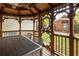 Gazebo interior with table, seating and view to the home beyond at 608 Hardendorf Ne Ave, Atlanta, GA 30307
