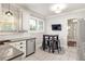Well-lit kitchen featuring new appliances and a table with stool seating at 608 Hardendorf Ne Ave, Atlanta, GA 30307