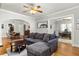 Open living space with hardwood floors, comfortable sectional couch, and access to dining and office at 608 Hardendorf Ne Ave, Atlanta, GA 30307