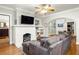 Bright living room featuring a fireplace, hardwood floors, and neutral paint at 608 Hardendorf Ne Ave, Atlanta, GA 30307