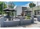 Charming outdoor seating area with tables, chairs, umbrellas and fountain for relaxed dining at 608 Hardendorf Ne Ave, Atlanta, GA 30307