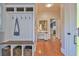 Cozy hallway offering functional mudroom storage with hooks and cubbies, and small desk at 907 Eden Se Ave, Atlanta, GA 30316