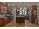 Stylish kitchen with stainless steel appliances, granite countertops, and a center island with seating at 907 Eden Se Ave, Atlanta, GA 30316