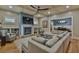 Cozy living room with fireplace, coffered ceiling, built-in bookshelves, and comfortable seating at 907 Eden Se Ave, Atlanta, GA 30316