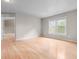 Bedroom with hardwood floors and a view of the neighborhood at 2030 Brook Meadow Dr, Alpharetta, GA 30005