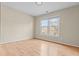 Bedroom with hardwood floors and a large window at 2030 Brook Meadow Dr, Alpharetta, GA 30005