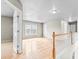 Spacious and bright bonus room with wood floors and natural light from the windows at 2030 Brook Meadow Dr, Alpharetta, GA 30005