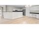 Kitchen with stainless appliances and bar seating in large open space at 2030 Brook Meadow Dr, Alpharetta, GA 30005