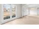 Bright living room with hardwood floors, illuminated by natural light and white trim at 2030 Brook Meadow Dr, Alpharetta, GA 30005