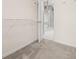 Walk-in closet showing access to the bathroom and carpet flooring at 2030 Brook Meadow Dr, Alpharetta, GA 30005