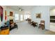 Spacious living room with a fireplace, and an open concept layout into the dining area at 211 Colonial Homes Nw Dr # 2304, Atlanta, GA 30309