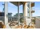 Relaxing balcony with patio furniture, offering views of the city skyline at 855 Peachtree Ne St # 2309, Atlanta, GA 30308