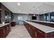 Well appointed bar area with long counters and cabinets at 855 Peachtree Ne St # 2309, Atlanta, GA 30308