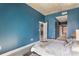 Comfortable bedroom with view into other rooms at 855 Peachtree Ne St # 2309, Atlanta, GA 30308