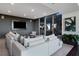 Common area with comfortable seating, modern entertainment system and views at 855 Peachtree Ne St # 2309, Atlanta, GA 30308