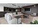 Relaxing common area with comfortable seating and a modern entertainment system at 855 Peachtree Ne St # 2309, Atlanta, GA 30308