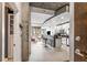Modern open-concept kitchen with stainless steel appliances and bar seating at 855 Peachtree Ne St # 2309, Atlanta, GA 30308