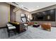 Stylish lounge area with modern furniture, a bar, and a TV at 855 Peachtree Ne St # 2309, Atlanta, GA 30308
