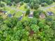 High angle view showcasing the surrounding community and lush tree coverage at 240 Mountain Ln, Covington, GA 30016