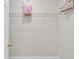 Empty closet with a wire shelf, offering space for storage and organization at 240 Mountain Ln, Covington, GA 30016