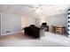 Spacious finished basement includes a cozy seating area, dining table, and convenient access to an adjacent bathroom at 2960 Cedar Knoll Dr, Roswell, GA 30076