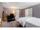 Comfortable basement bedroom includes a desk area and ample closet space, making it ideal for guests or a home office at 2960 Cedar Knoll Dr, Roswell, GA 30076