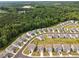 An overhead view showing the community's attractive landscaping and the nearby treeline at 96 Quail Bend Way, Dallas, GA 30157