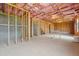 A large, unfinished basement with visible insulation at 96 Quail Bend Way, Dallas, GA 30157