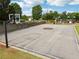 Community basketball court near a playground with lush green surroundings and ample space at 96 Quail Bend Way, Dallas, GA 30157