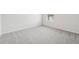 Bedroom showcases neutral carpet and bright natural light at 96 Quail Bend Way, Dallas, GA 30157