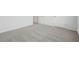 An empty bedroom with a carpeted floor and white doors at 96 Quail Bend Way, Dallas, GA 30157