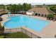 Community pool offers a large swimming area and plentiful lounge chairs for relaxation at 96 Quail Bend Way, Dallas, GA 30157