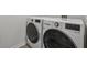 Bright laundry room with a new, white washing machine and dryer at 96 Quail Bend Way, Dallas, GA 30157