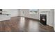 Living room with hardwood floors and a fireplace at 96 Quail Bend Way, Dallas, GA 30157