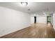 Basement with laminate flooring and recessed lighting showing plenty of room at 13090 Magnolia Crescent Dr, Roswell, GA 30075