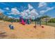 Community playground with colorful play structures and ample space for children to enjoy at 13090 Magnolia Crescent Dr, Roswell, GA 30075