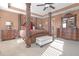 Well lit main bedroom with beautiful furniture and natural light at 1152 Werre Way, Locust Grove, GA 30248