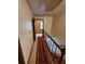 Hallway with stairs and railings at 542 Banks E Rd, Fayetteville, GA 30214