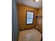 The laundry room features a window and tile floors at 542 Banks E Rd, Fayetteville, GA 30214