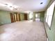 Spacious main bedroom with ceiling fan and natural light at 542 Banks E Rd, Fayetteville, GA 30214