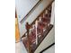 A staircase with carpet and wooden railings at 542 Banks E Rd, Fayetteville, GA 30214