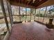Sunroom with mosaic tile flooring and glass windows at 542 Banks E Rd, Fayetteville, GA 30214