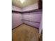 Walk-in closet with shelving at 542 Banks E Rd, Fayetteville, GA 30214